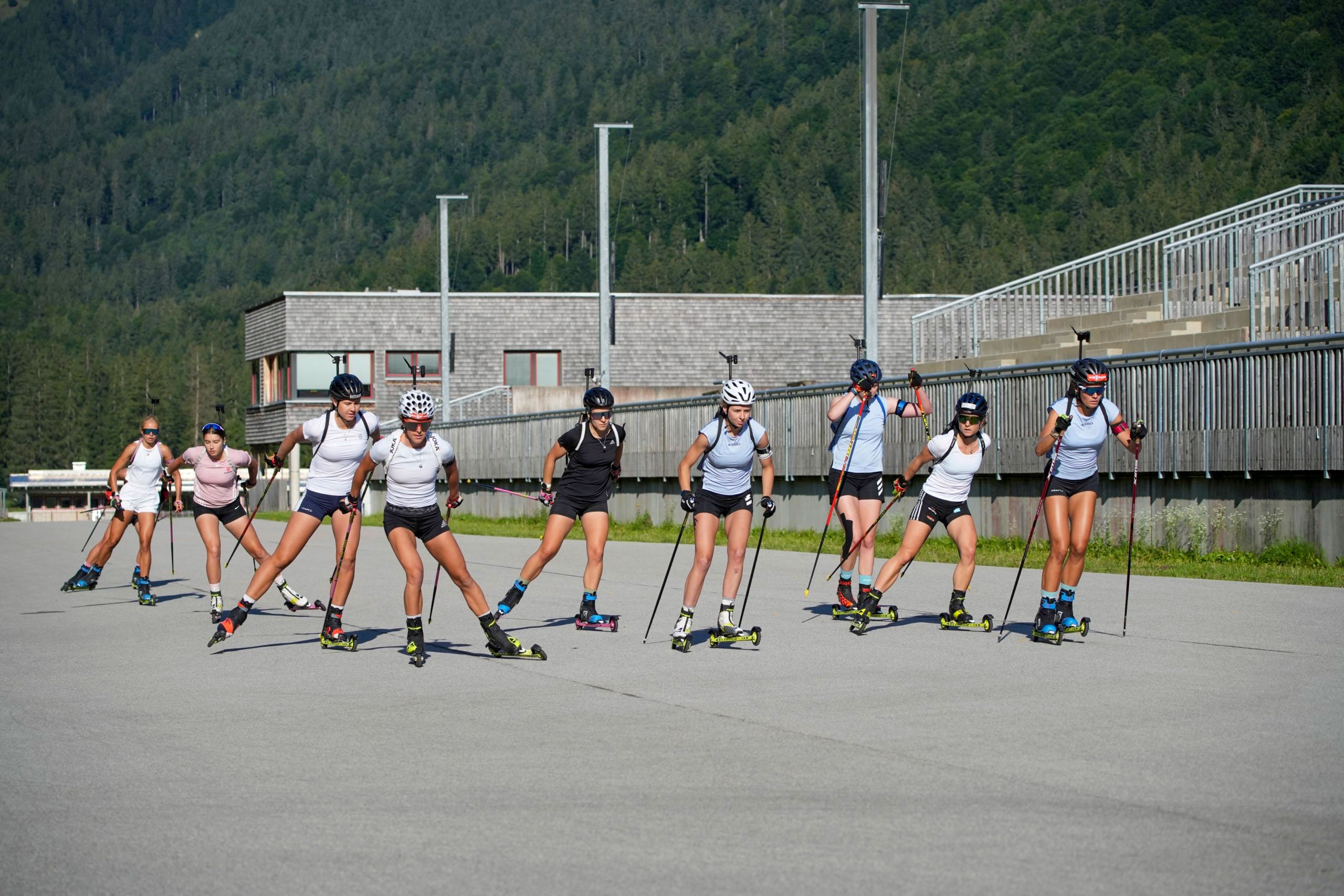 A group of roller skiers. Photo © Christian Reiter 2023